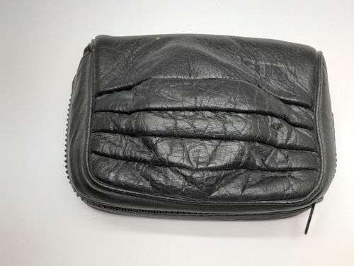 Vintage Original Black Leather Case for Perti Color Compact Camera: Protect and Preserve Your Classic Photography.